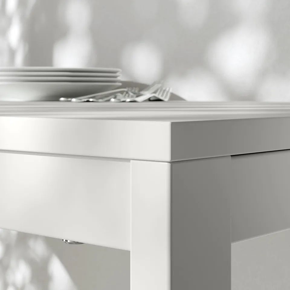 Modern dining table with clean lines, high-quality finish, and sturdy design.