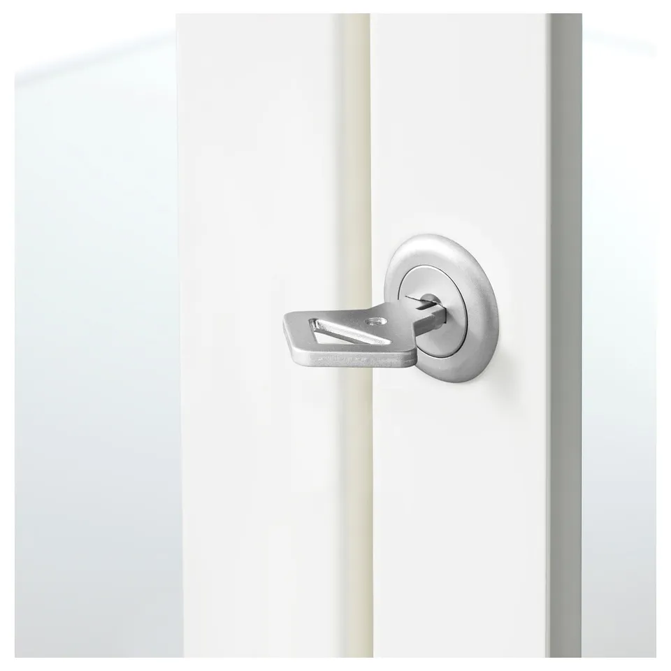 Silver metal handle and lock on clear glass door, showcasing quality and security.