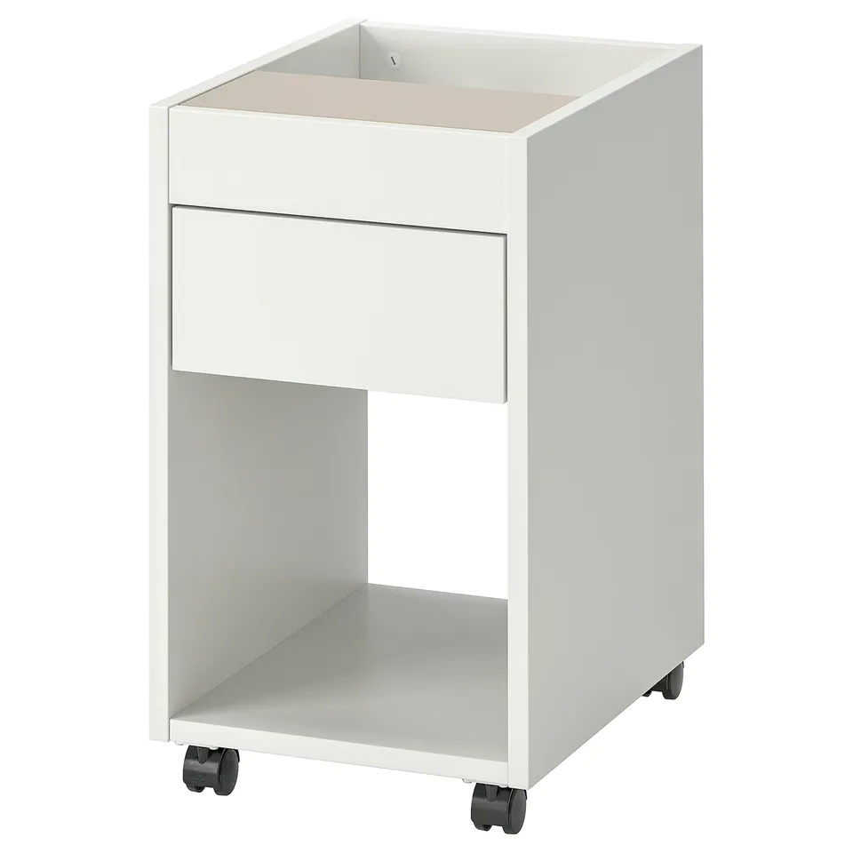 A TONSTAD white rolling cabinet with one drawer and open storage, showcasing minimalist design and functionality.