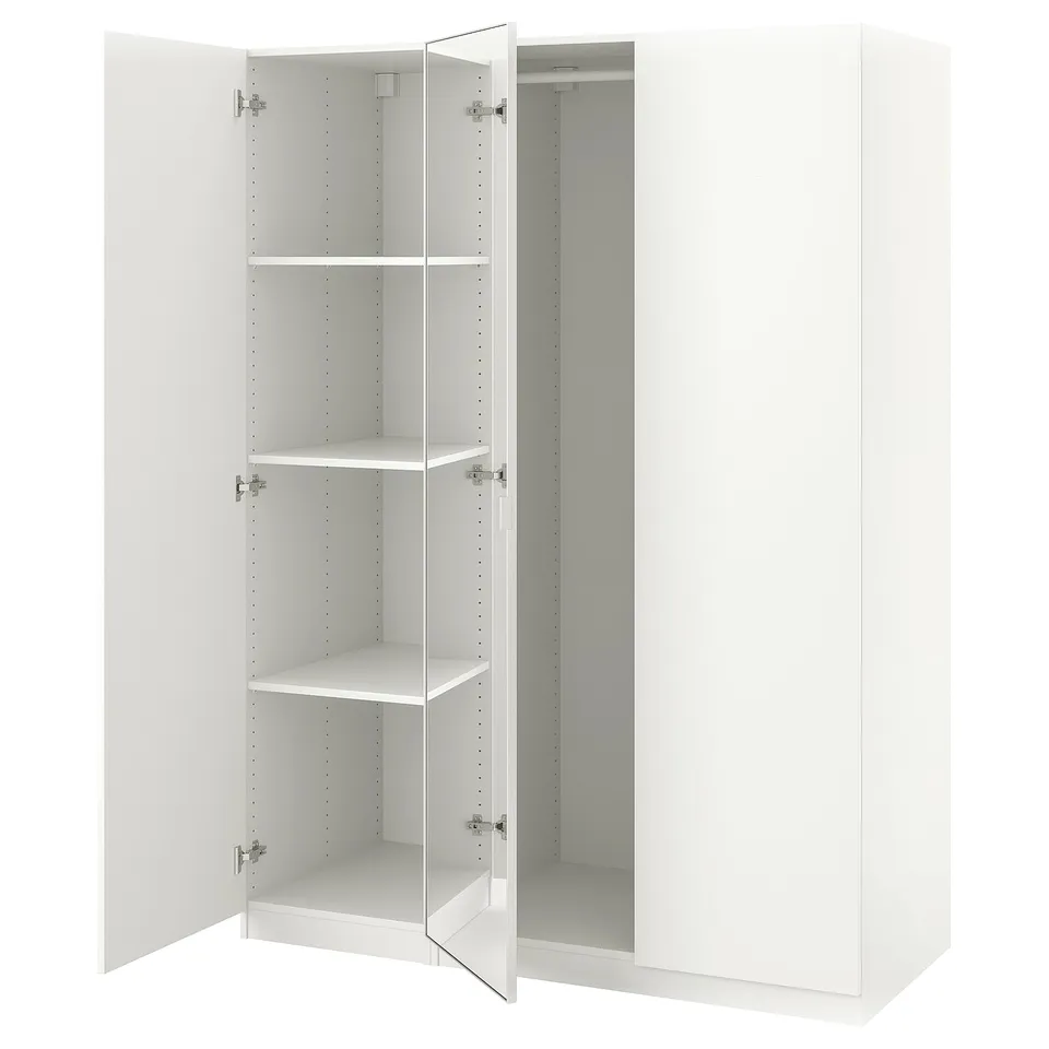 A white ikea PAX wardrobe with mirrored doors and open shelves. Its rectangular, simple, and modern.