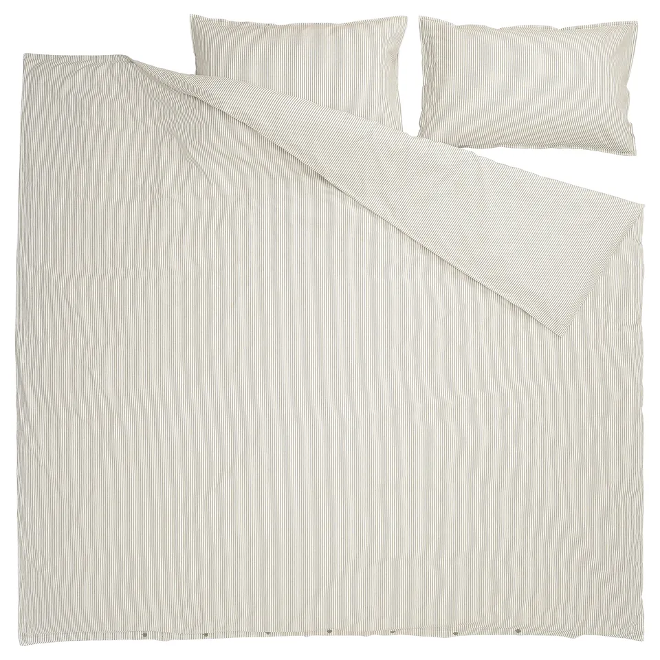 A beige and white striped SOLFIBBLA duvet cover set. Made from recycled cotton, it includes a duvet cover and two pillowcases.