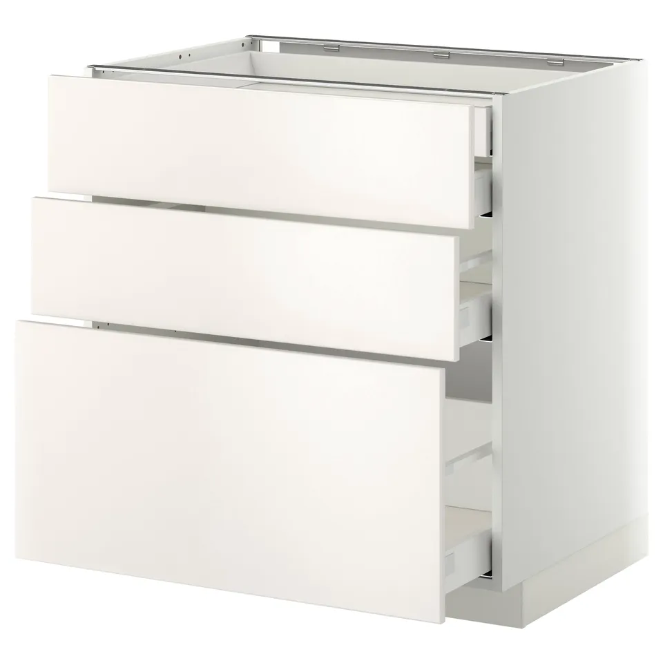 White METOD kitchen cabinet with three smooth drawers, sleek and modern design.
