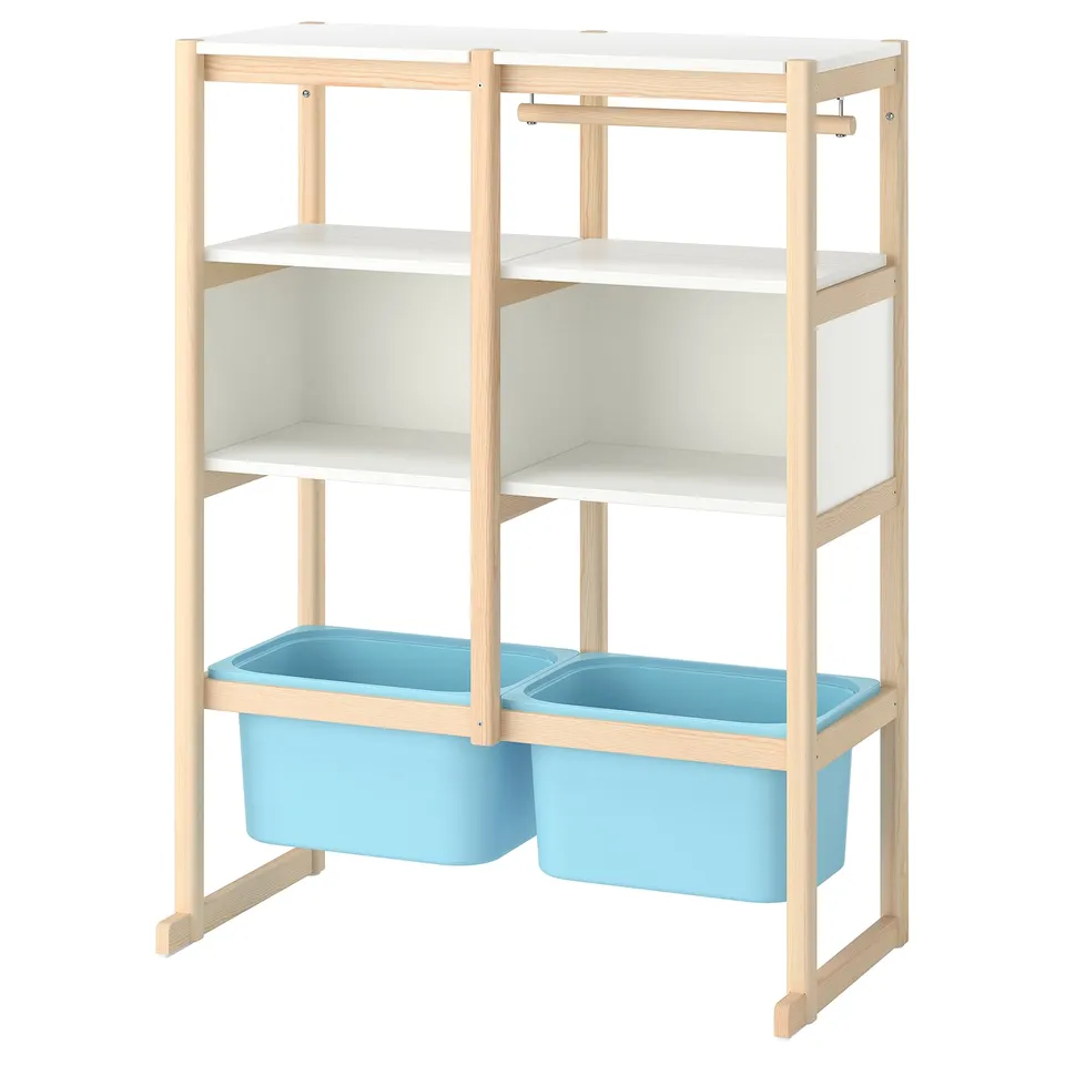 An IKEA FLISAT white and light wood kids storage unit with blue bins.