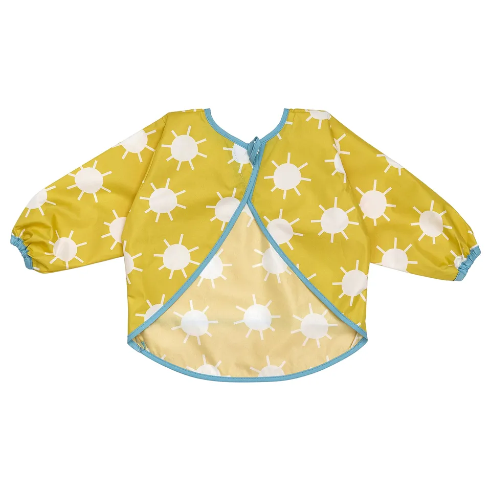 Yellow sun-printed kids bib, long sleeves, blue trim.
