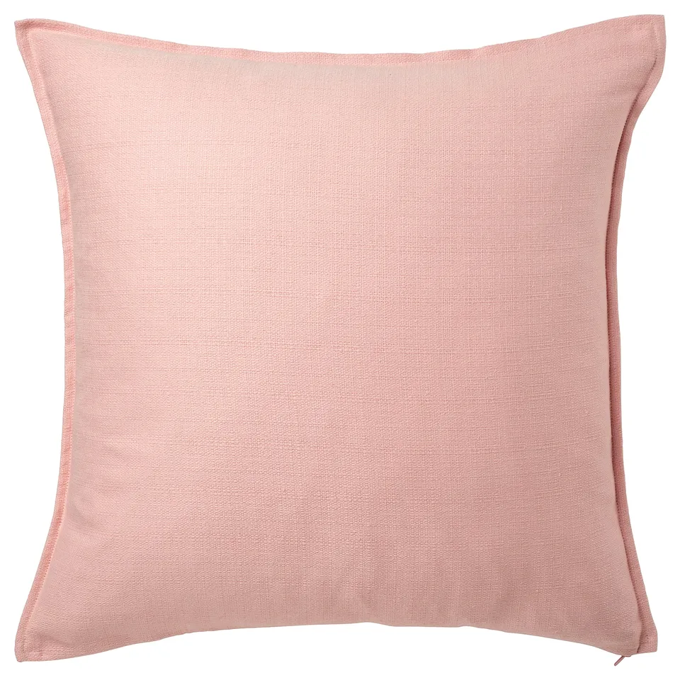 Pink, square pillow with zip, textured polyester.