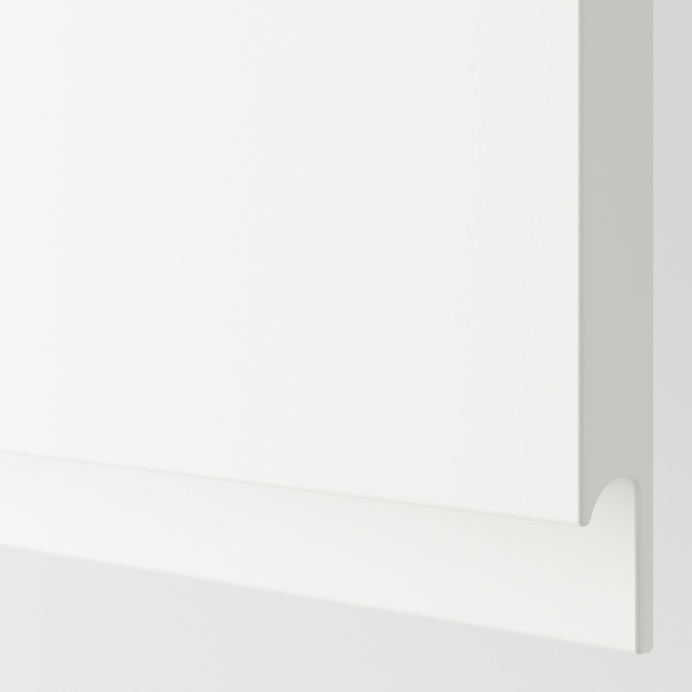 Close-up of METOD kitchen unit in pristine white, showcasing modern, smooth lines and robust design.