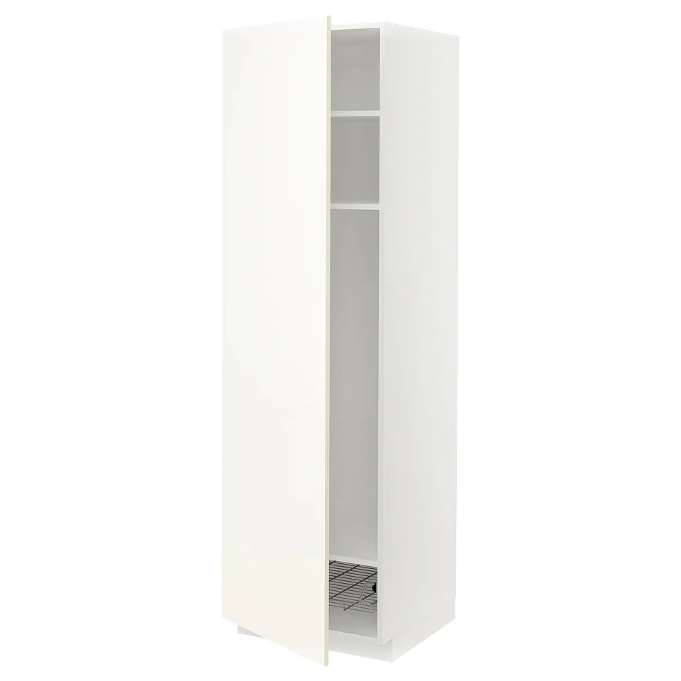 A white ikea METOD kitchen cabinet with a door open, revealing an adjustable shelf and metal basket inside.
