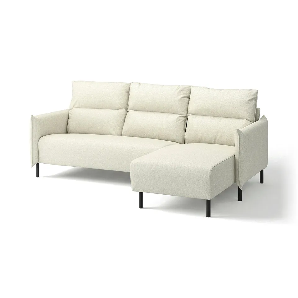 Modern light grey sectional sofa with soft cushions, high back, and black metal legs.