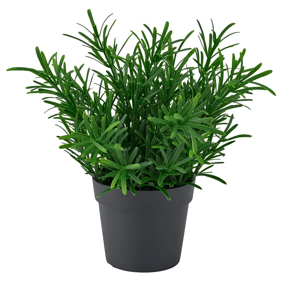 Small potted green artificial plant in grey container, eco-friendly with recycled materials.