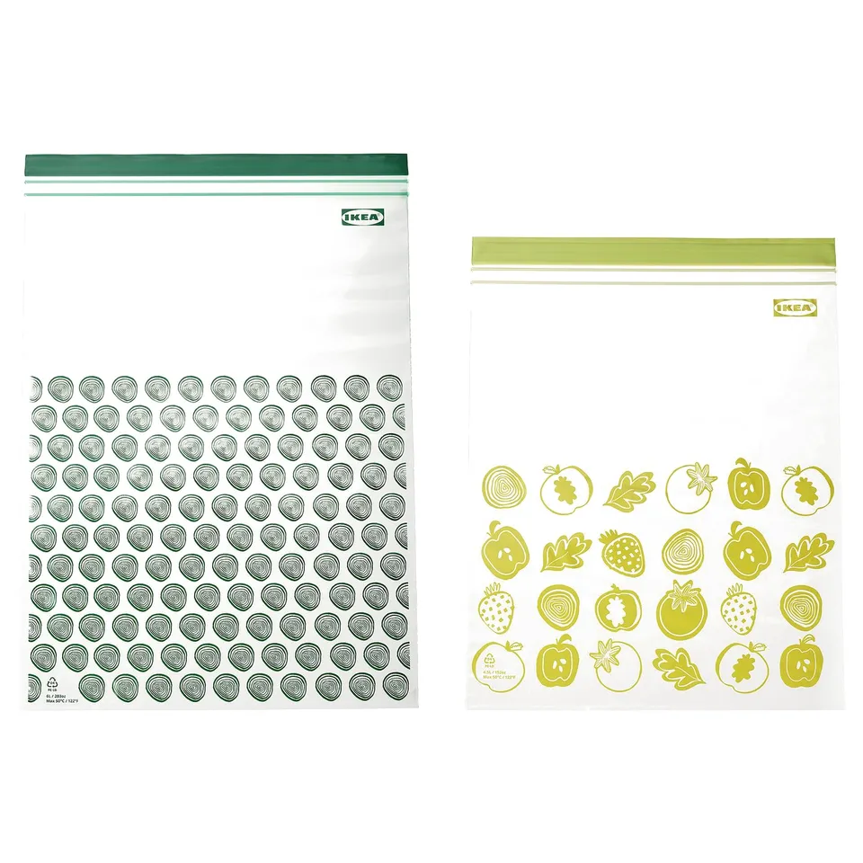 Two ikea ISTAD resealable bags: one green, one yellow, with fruit designs, made of polyethylene.