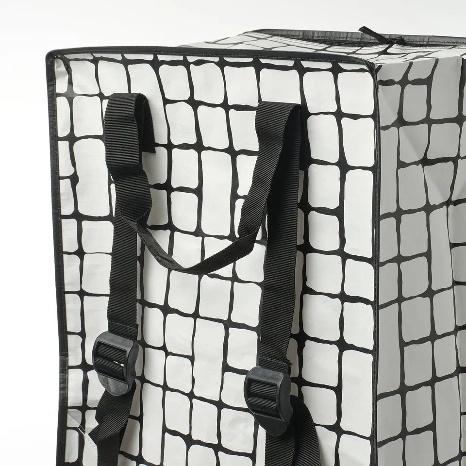 Large reusable storage bag with sturdy black handles and adjustable shoulder straps. Crocodile pattern, durable, wipe-clean material.