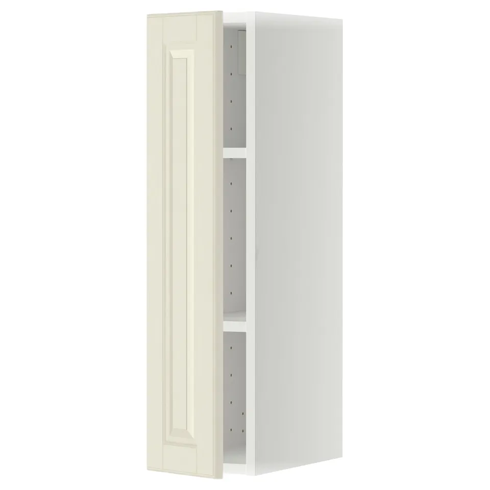 An off-white METOD kitchen cabinet with bevelled edges, standing tall and rectangular, with a door open revealing multiple shelves inside.