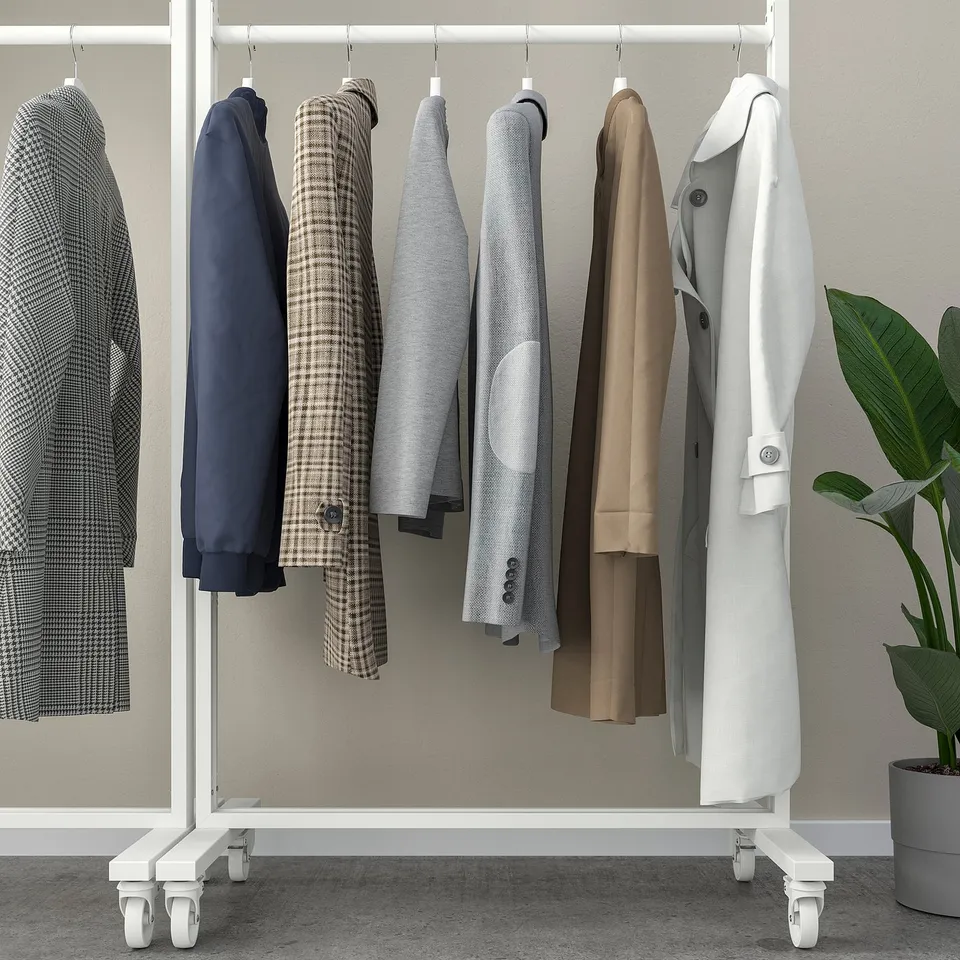 Coat rack with multiple hangers, displaying various jackets and coats. Perfect for organising and storing outerwear.