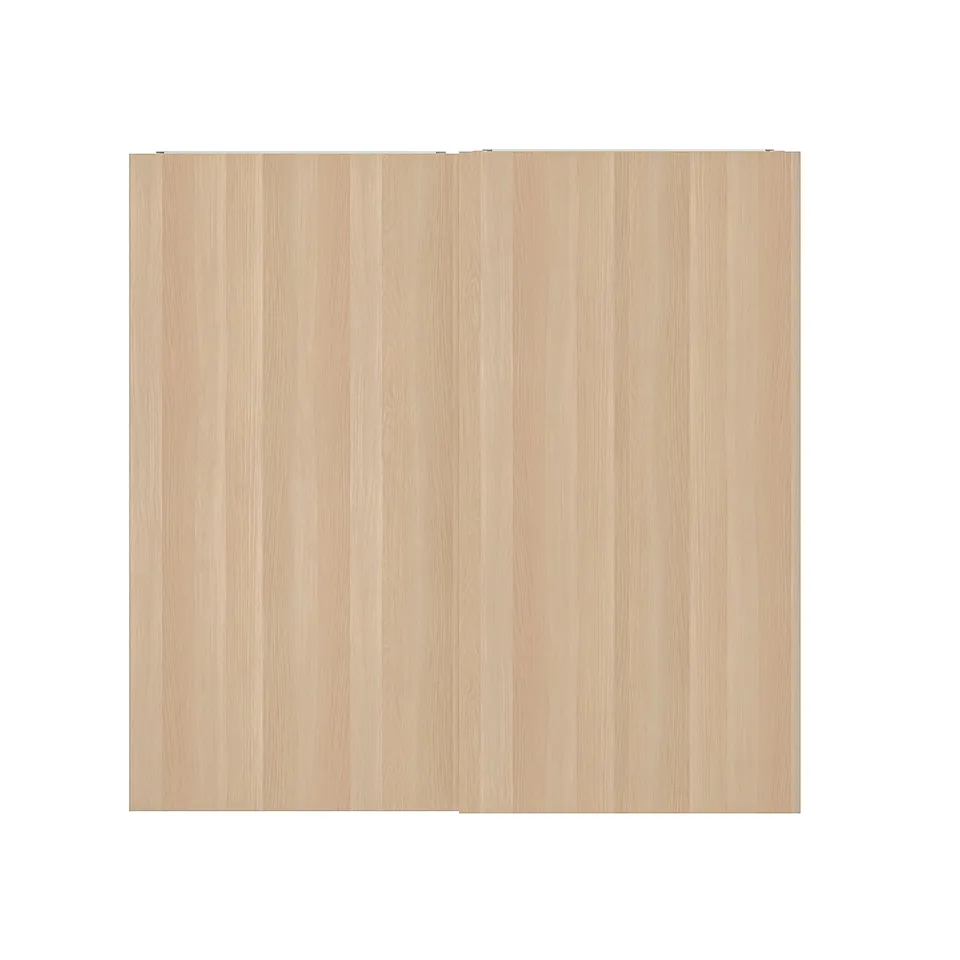 A HASVIK sliding door in light wood finish, featuring a smooth, wood-like texture and sleek design.