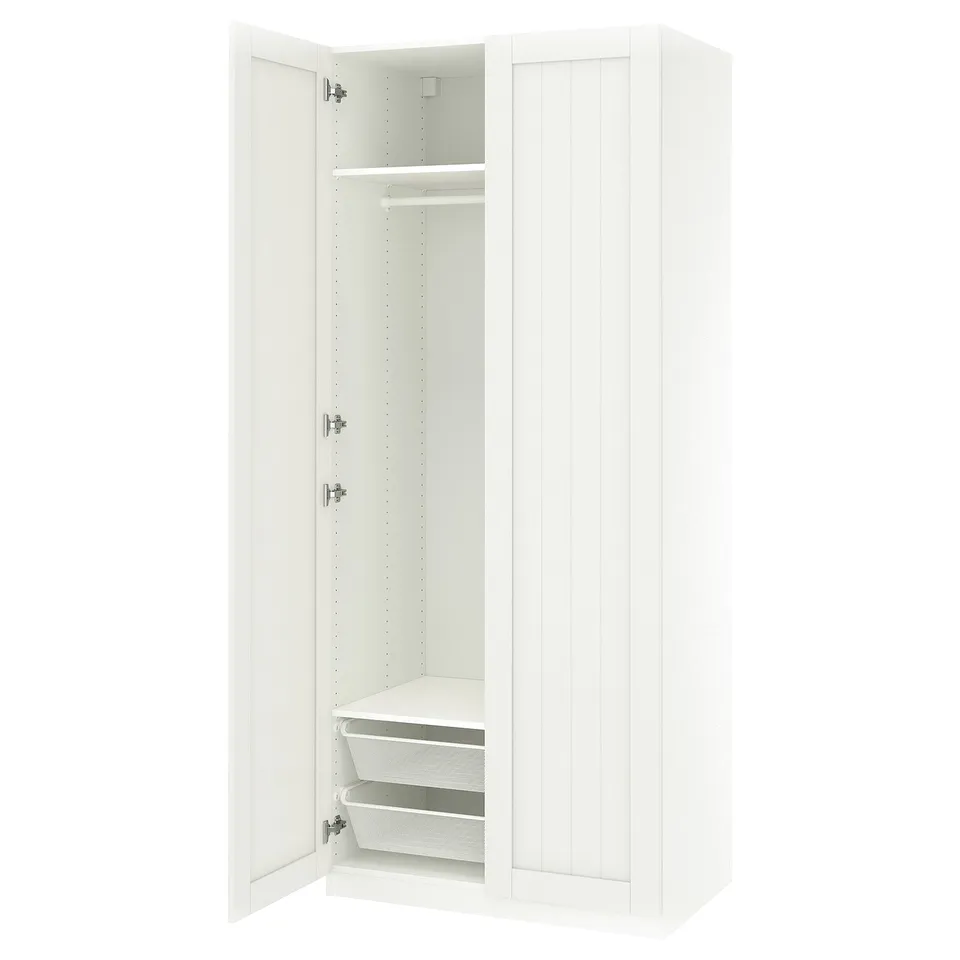 White PAX wardrobe, open showing shelves and mesh baskets.