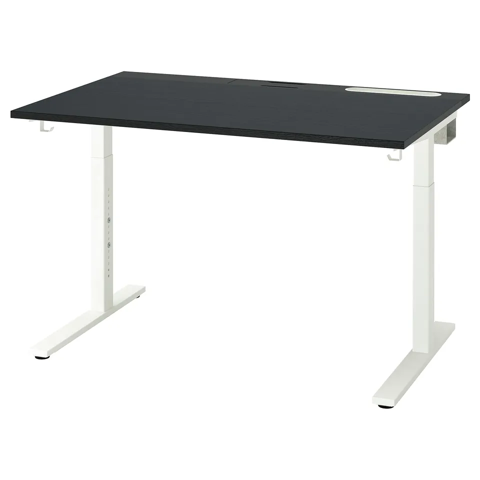 MITTZON desk: black rectangular tabletop, white metal legs, sturdy office setup.