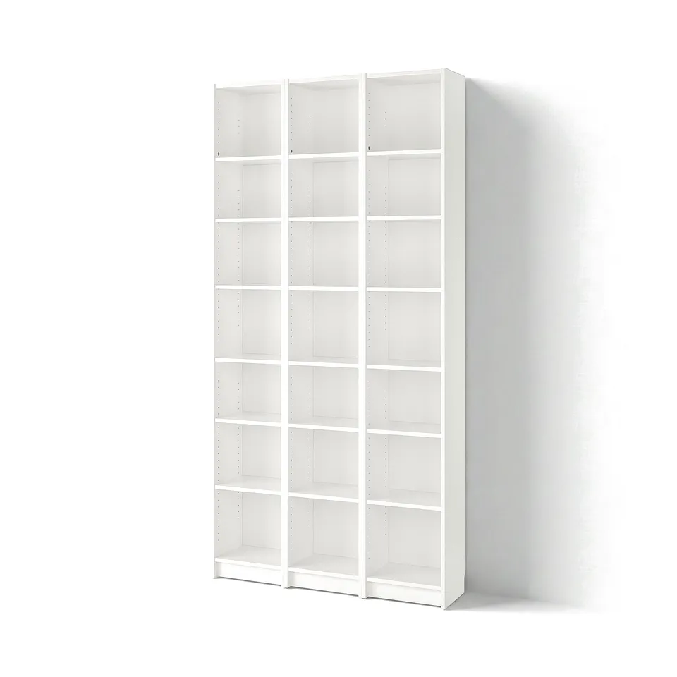 White BILLY bookcase, tall and empty, clean design, made of particleboard.
