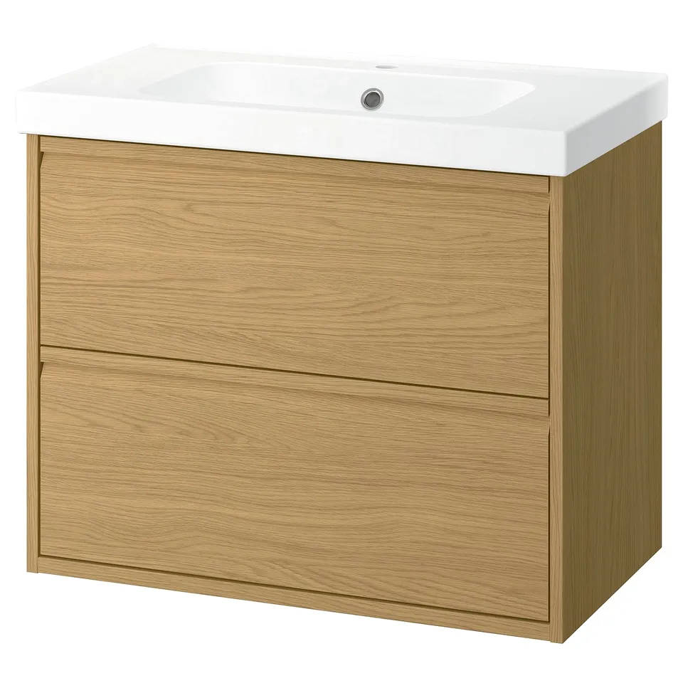 The ÄNGSJÖN light wood vanity with a white sink, featuring two spacious drawers for bathroom storage.