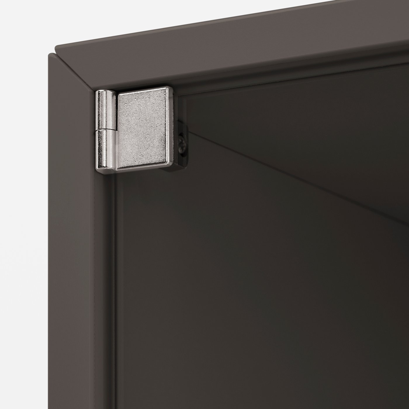 Silver hinged edge of dark grey cabinet door, showcasing sturdy and sleek design.