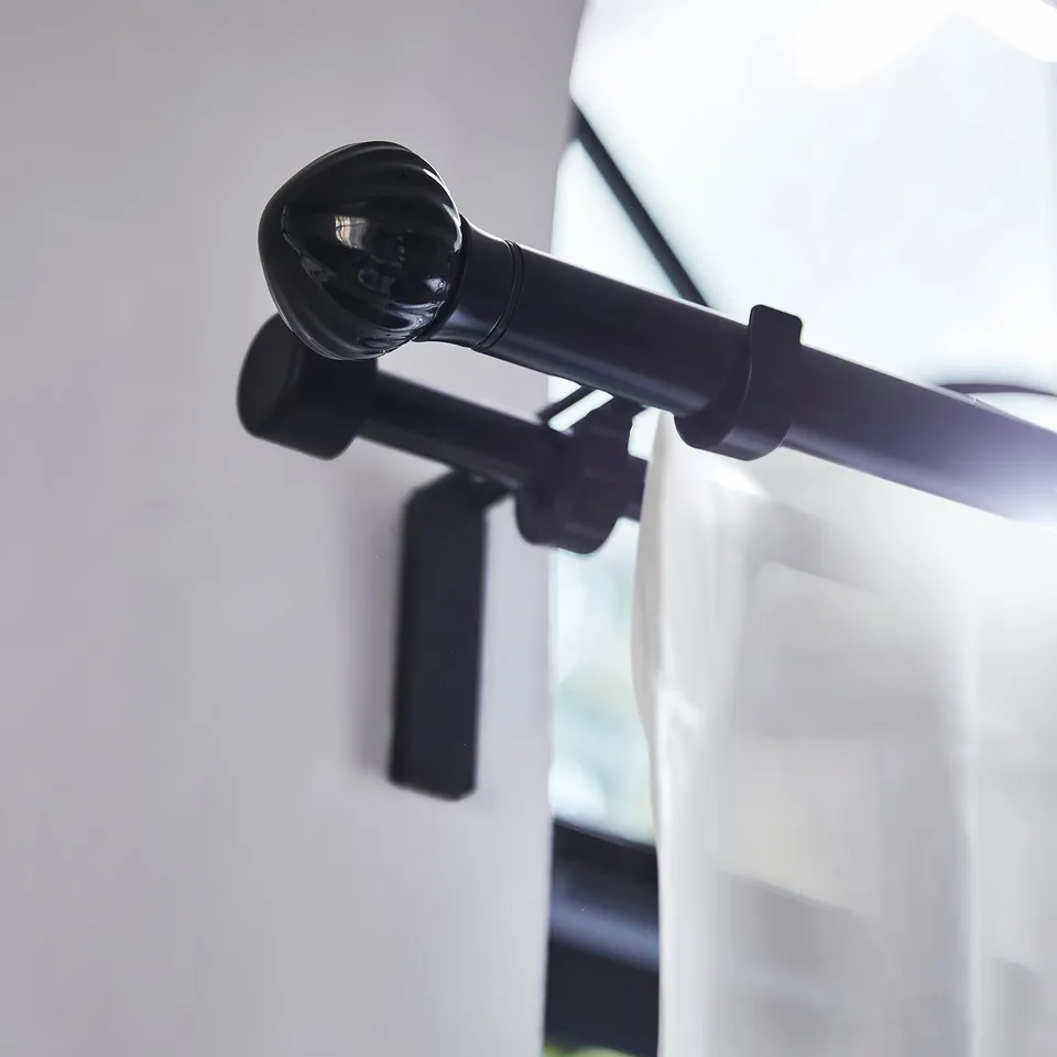 LERBRONIA black ceramic finial, sleek & round, mounts easily on curtain rod, adds discrete elegance.