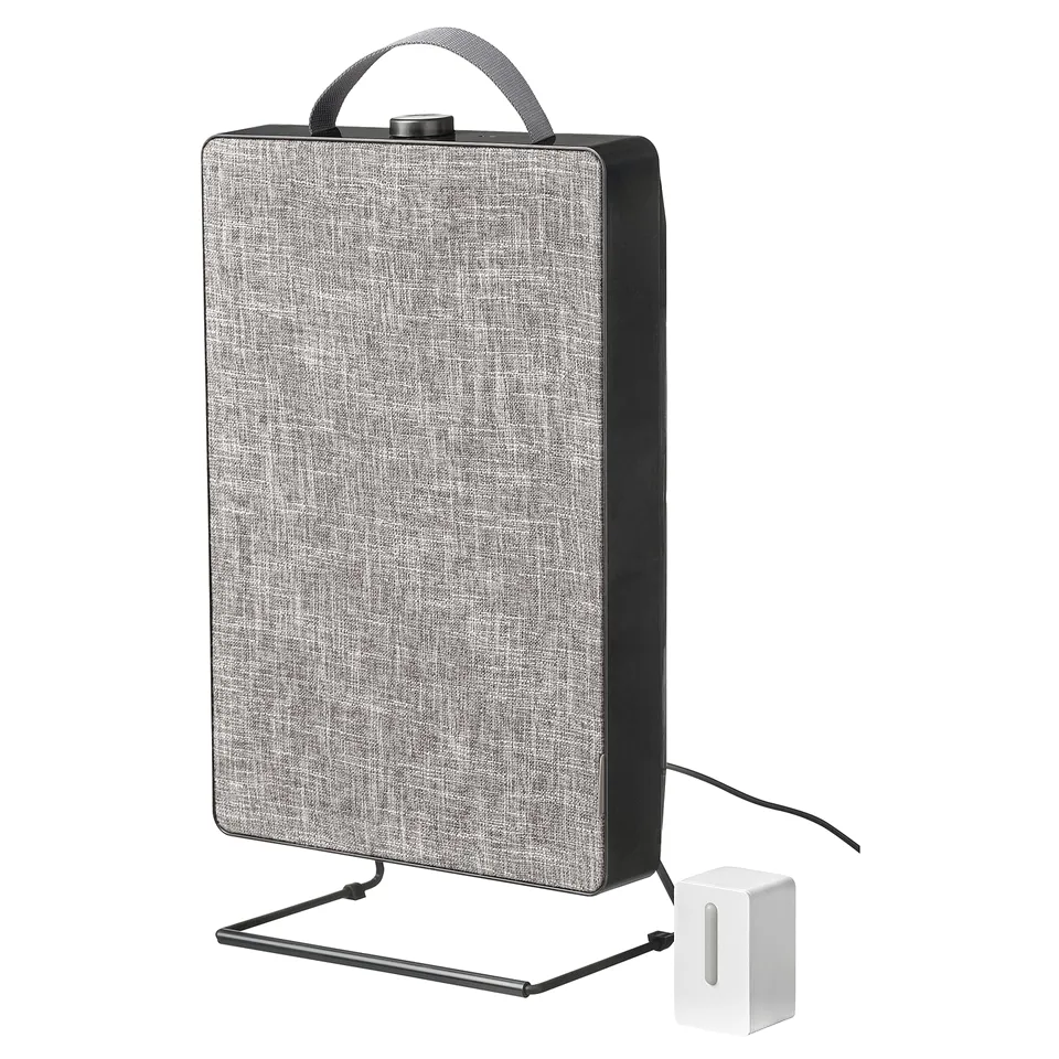 Grey FÖRNUFTIG air purifier with handle, stand, and sensor. Modern, portable design.