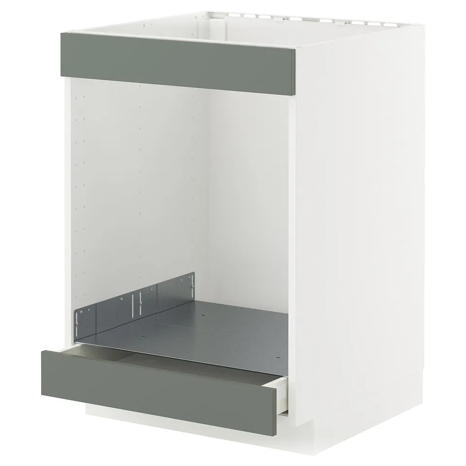 METOD kitchen unit with grey-green drawer fronts, white base.