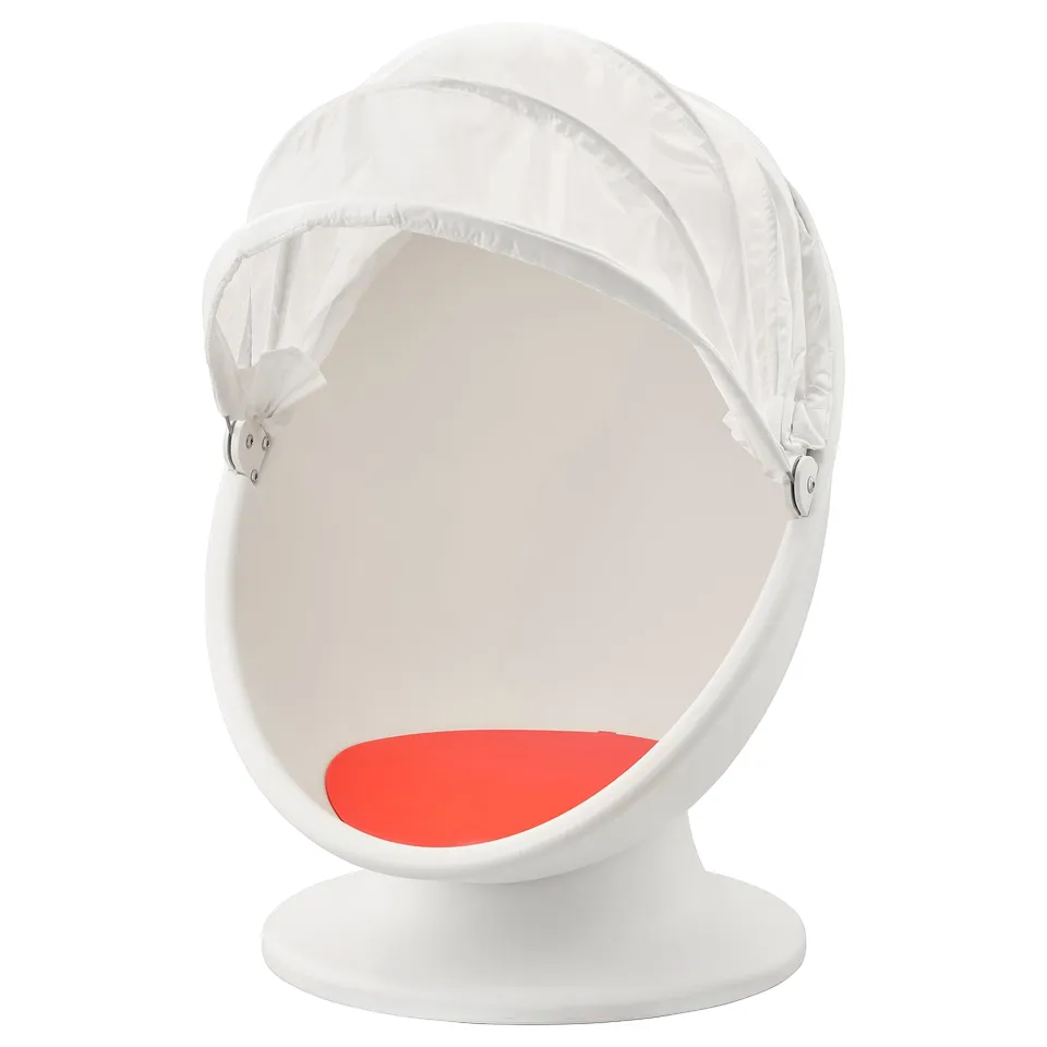 IKEA PS LÖMSK white armchair with red seat, round and swivel shape, fabric hood, and modern design.