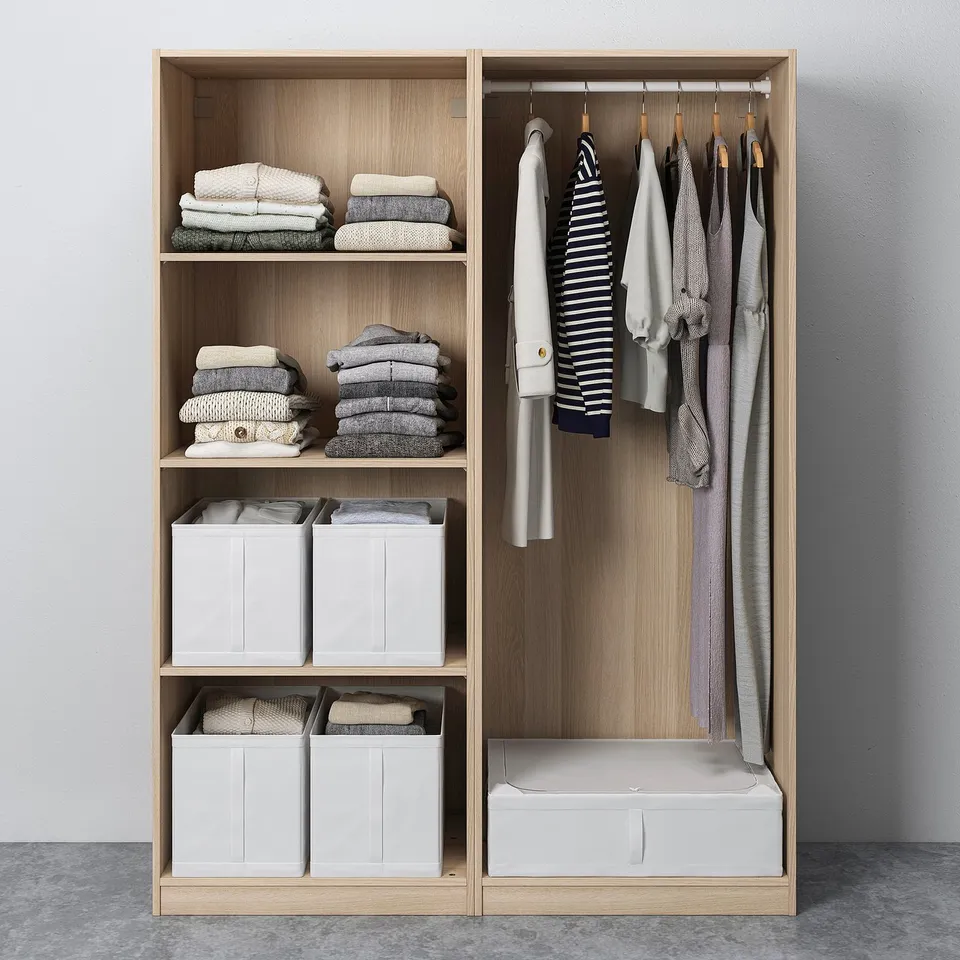 Organised closet with shelves stacked with folded clothes and hanging garments, featuring adjustable feet and sliding doors.