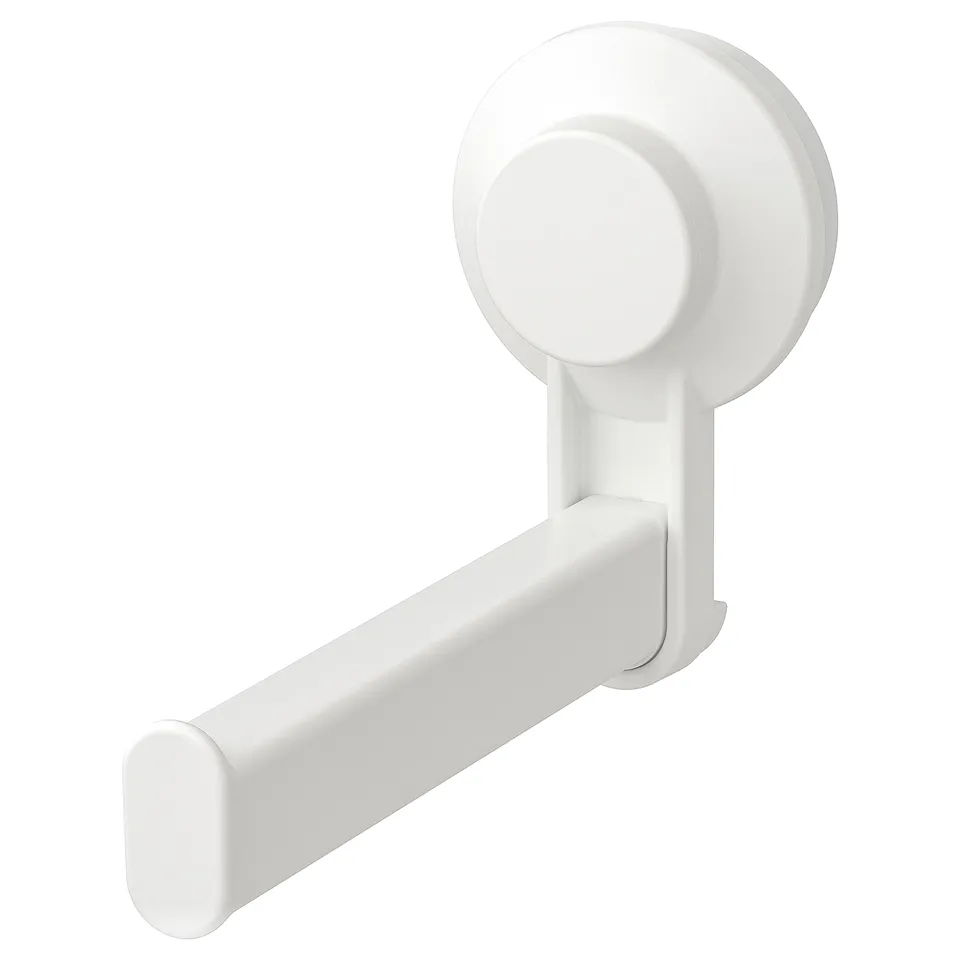 A white TISKEN suction cup toilet paper holder with a cylindrical design and an arm to hold the roll.