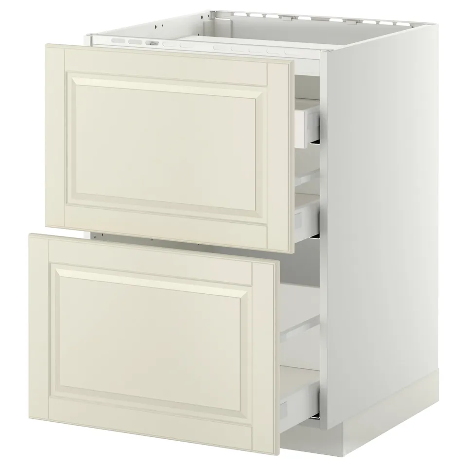 Depicts an off-white METOD kitchen cabinet with two open drawers, featuring a classic design with bevelled edges.