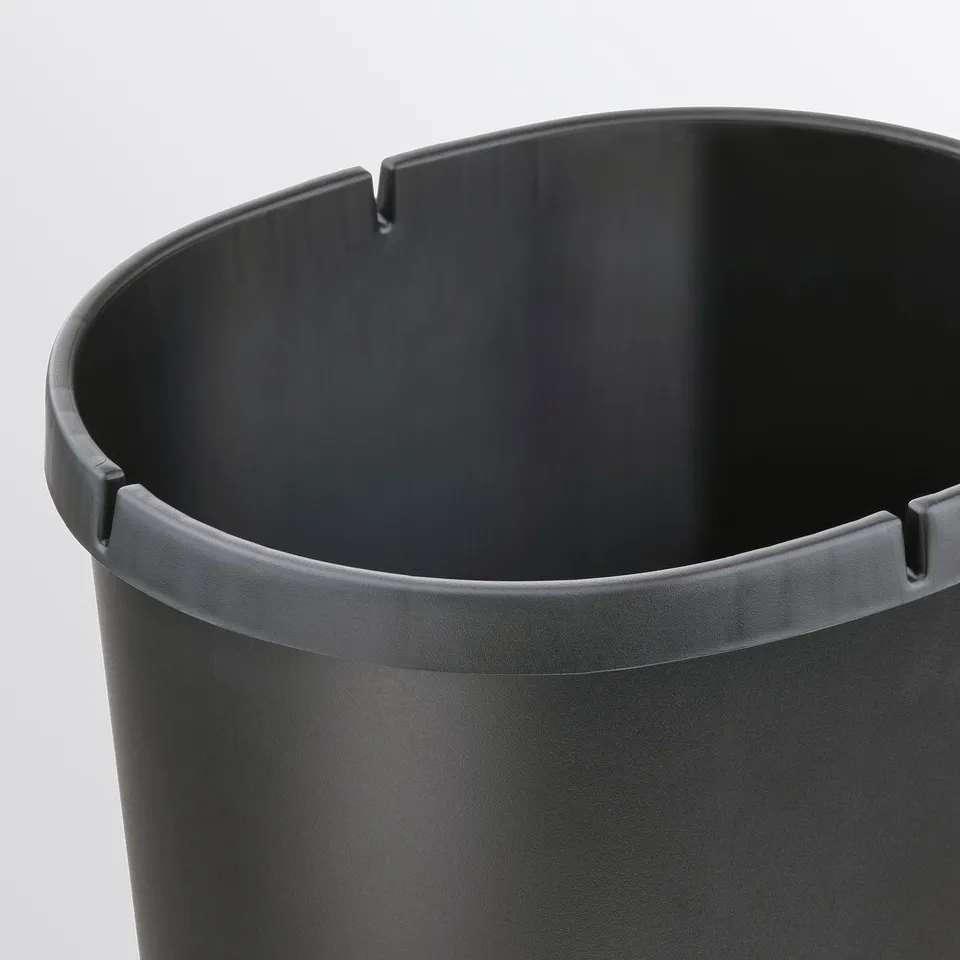 Modern, sleek black plastic bin with smooth edges and removeable lid for easy cleaning.