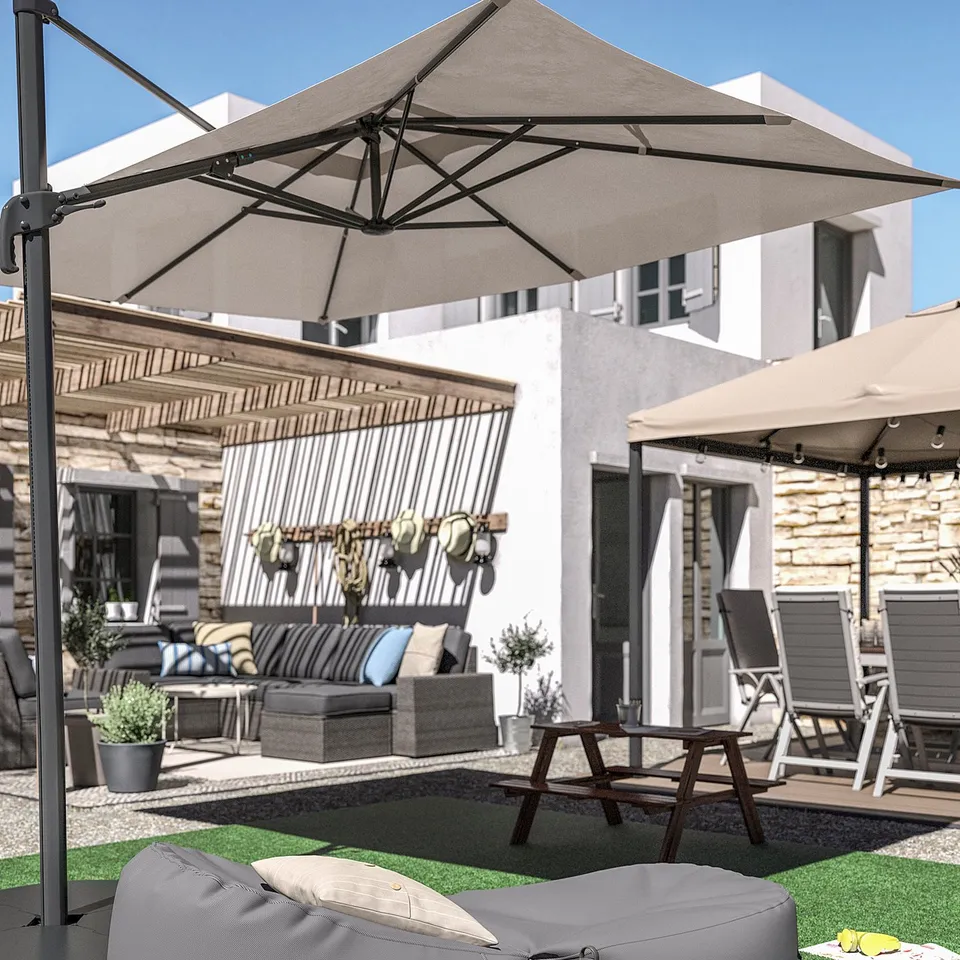 Relaxed patio with RUNNEN grey artificial grass, outdoor furniture, and large beige umbrella.