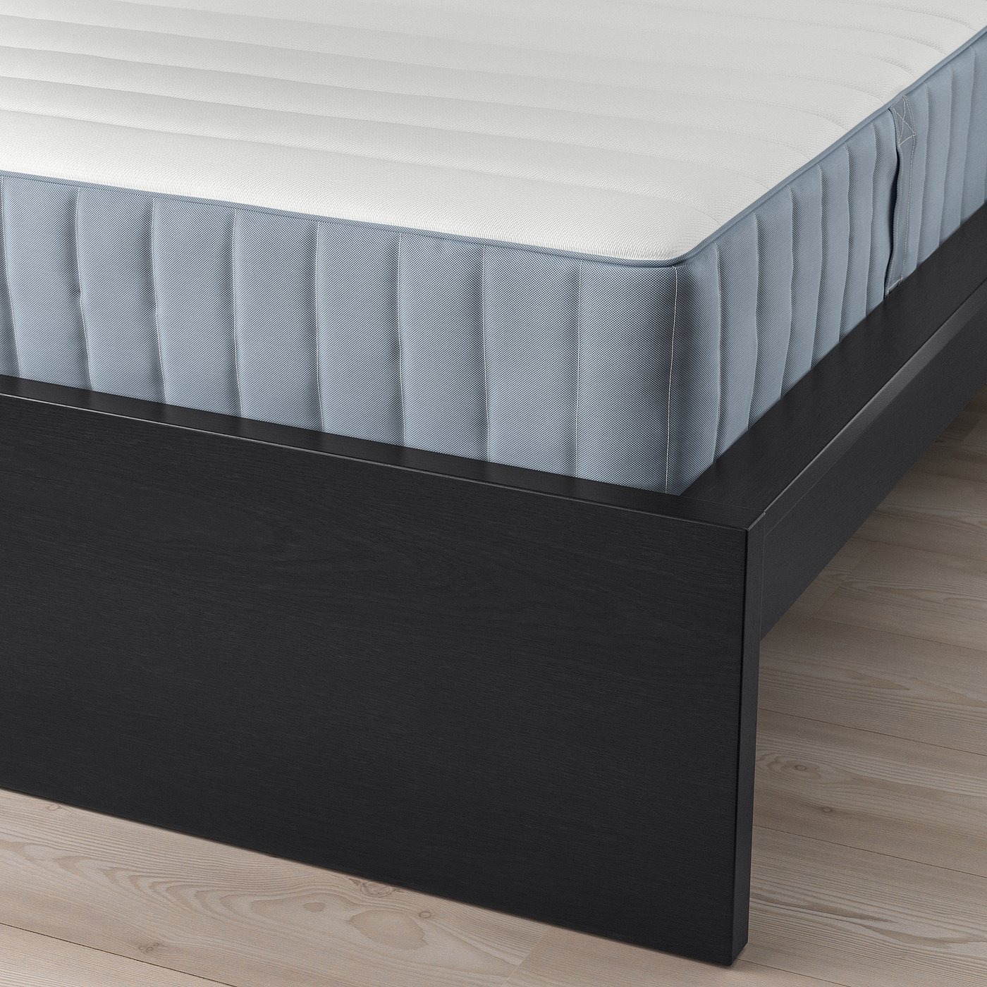 MALM bed frame with adjustable sides, high headboard, and slatted base for air circulation.