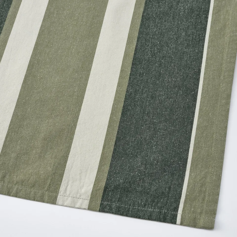 Striped towel with green and white patterns, made of cotton and jute for high absorbency.