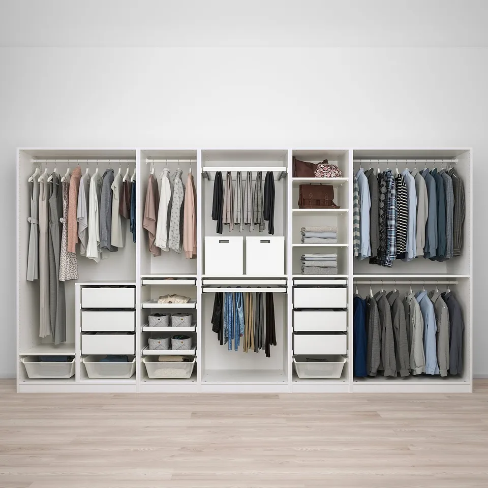 Well-organized walk-in closet with clothes hangers, shelves, and drawers. Blend storage and accessibility.
