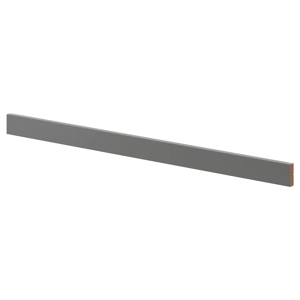 Grey rectangular trim under cabinets or moulding.