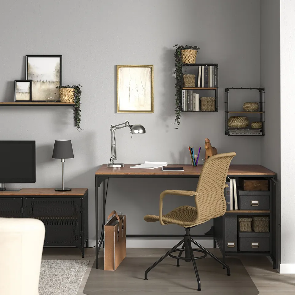 Home office with FJÄLLBO desk & chair, decor. Metal & wood desk, wicker adjustable chair. Modern, industrial style.
