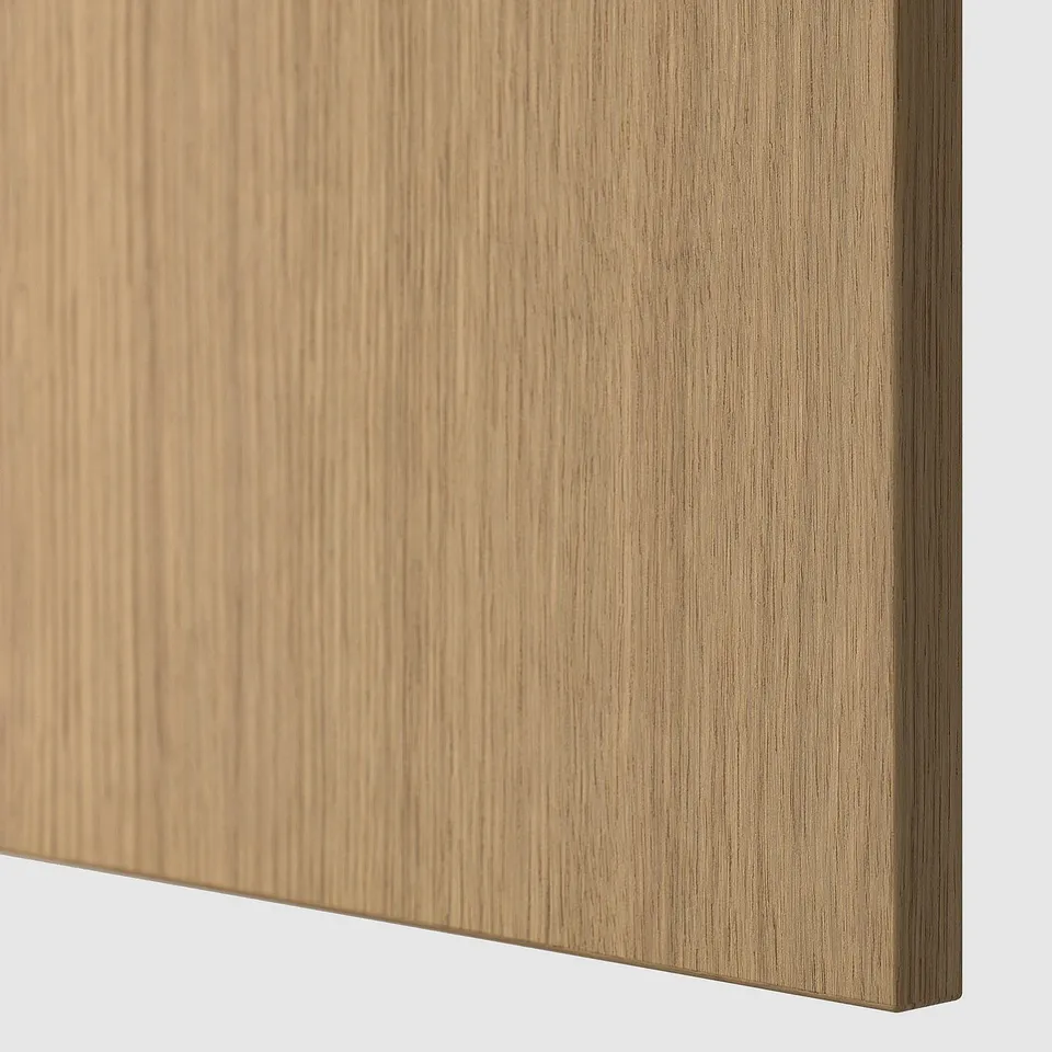 Close-up of smooth, light oak wooden panel with fine grain texture, showcasing natural wood finish.