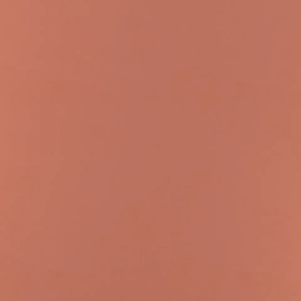 Solid orange surface, smooth and even texture, high-quality finish.