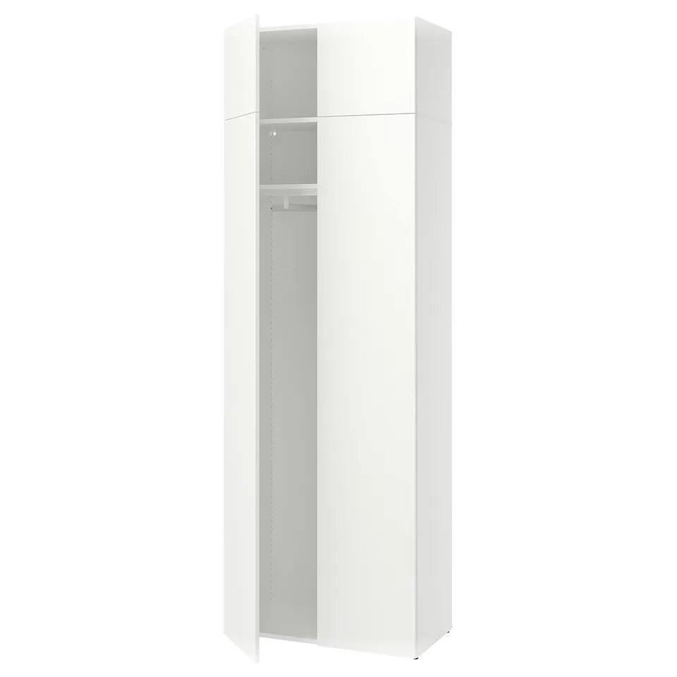 A white LASTARE wardrobe with a tall, rectangular shape, featuring two open doors revealing an empty interior with shelves and a clothes rail.