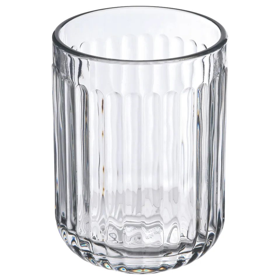 Clear glass bathroom accessory, cylindrical shape with vertical ribs, part of the SILVTJÄRN collection.