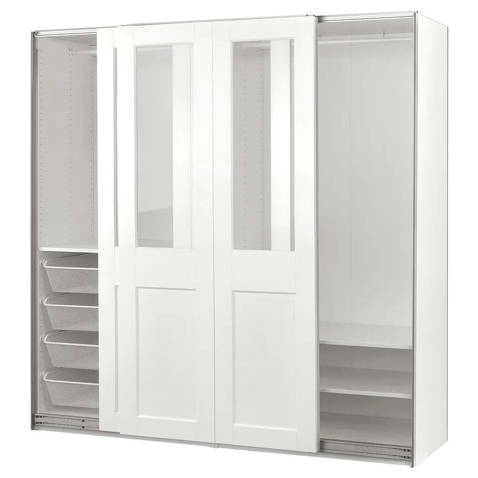 White PAX wardrobe with glass doors, clear shelves, mesh basket, soft-close feature.