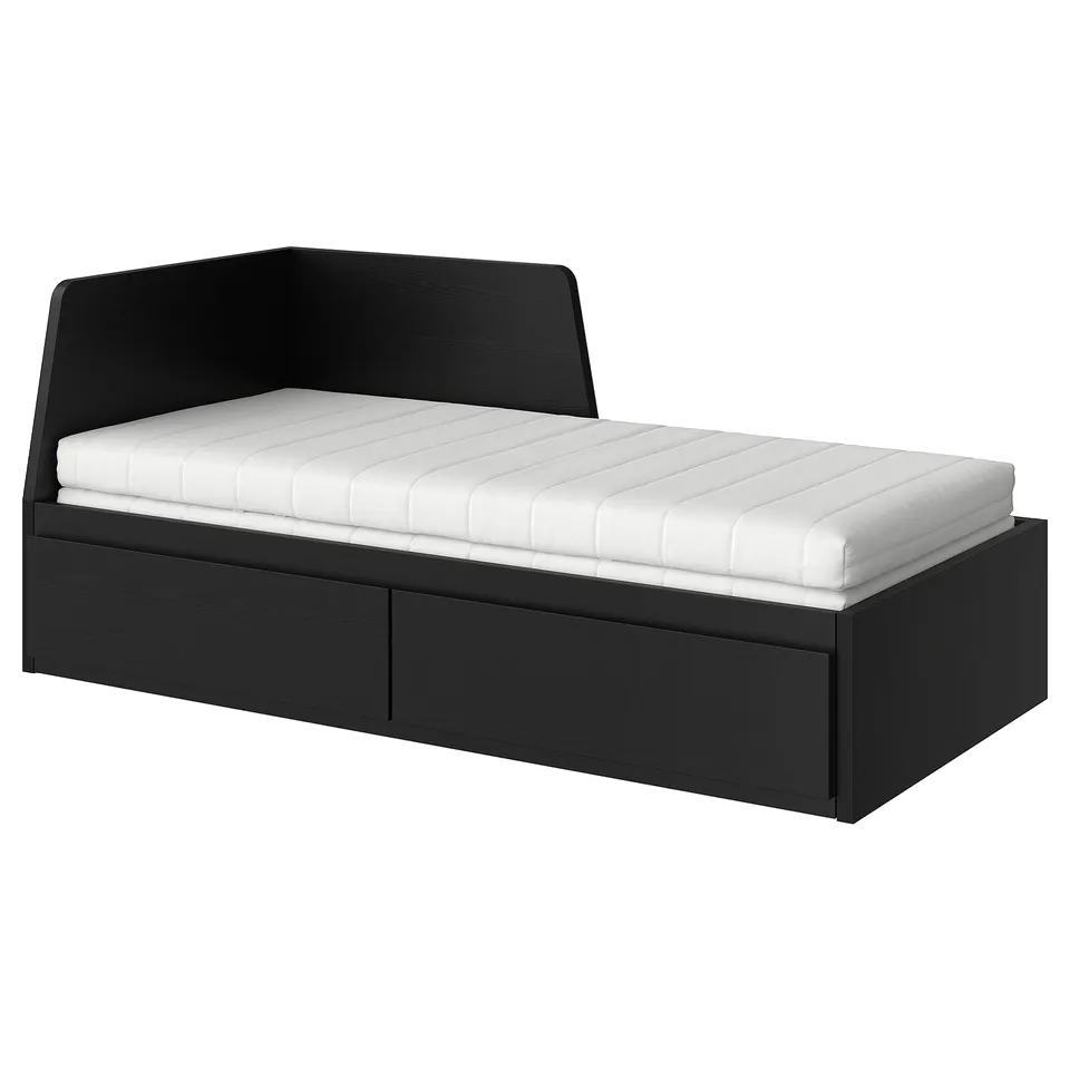 Black FLEKKE convertible daybed with storage drawers and foam mattress.