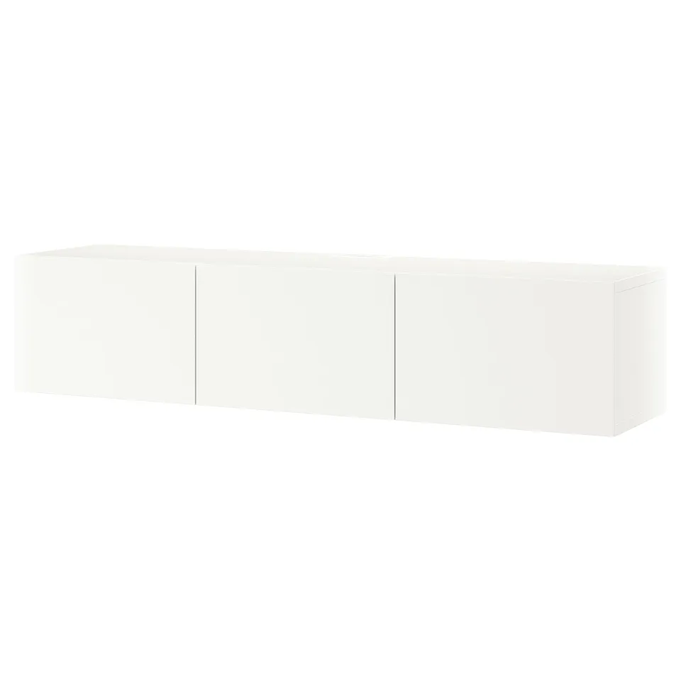 A white BESTÅ tv bench with three doors. Its a sleek, rectangular storage unit with a modern design.