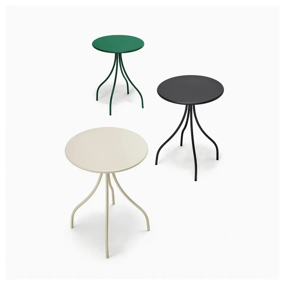 Three modern tables in green, black, and beige. Each has a round top and unique, curved leg design.