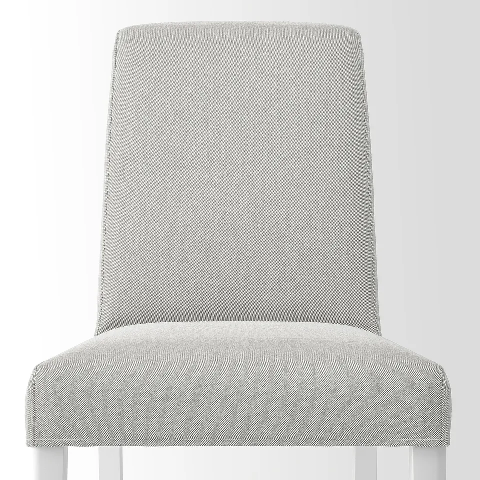 Modern upholstered chair with high backrest, light grey fabric, and sturdy wooden legs. Comfortable and stylish design.