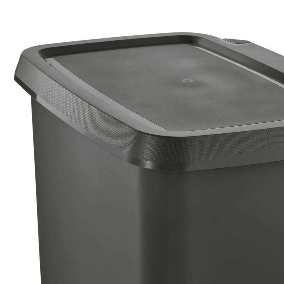 Modern, sleek, black pedal bin with smooth, rounded edges and large, secure lid.