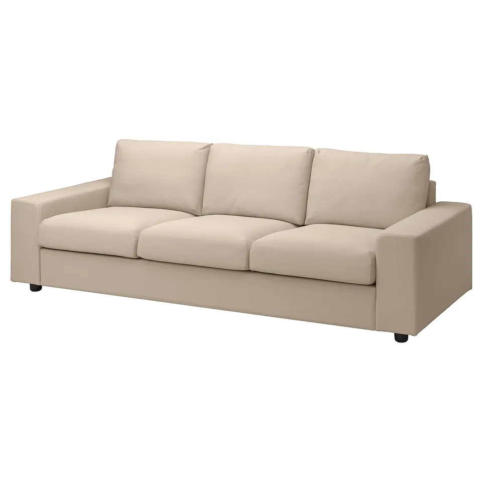 A beige VIMLE sofa with a sectional design, featuring a soft, comfortable fabric cover in a modern style.