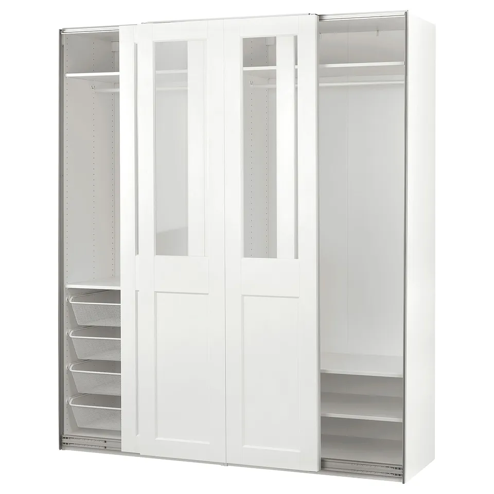 A white PAX wardrobe with glass doors, displaying shelves and drawers inside.