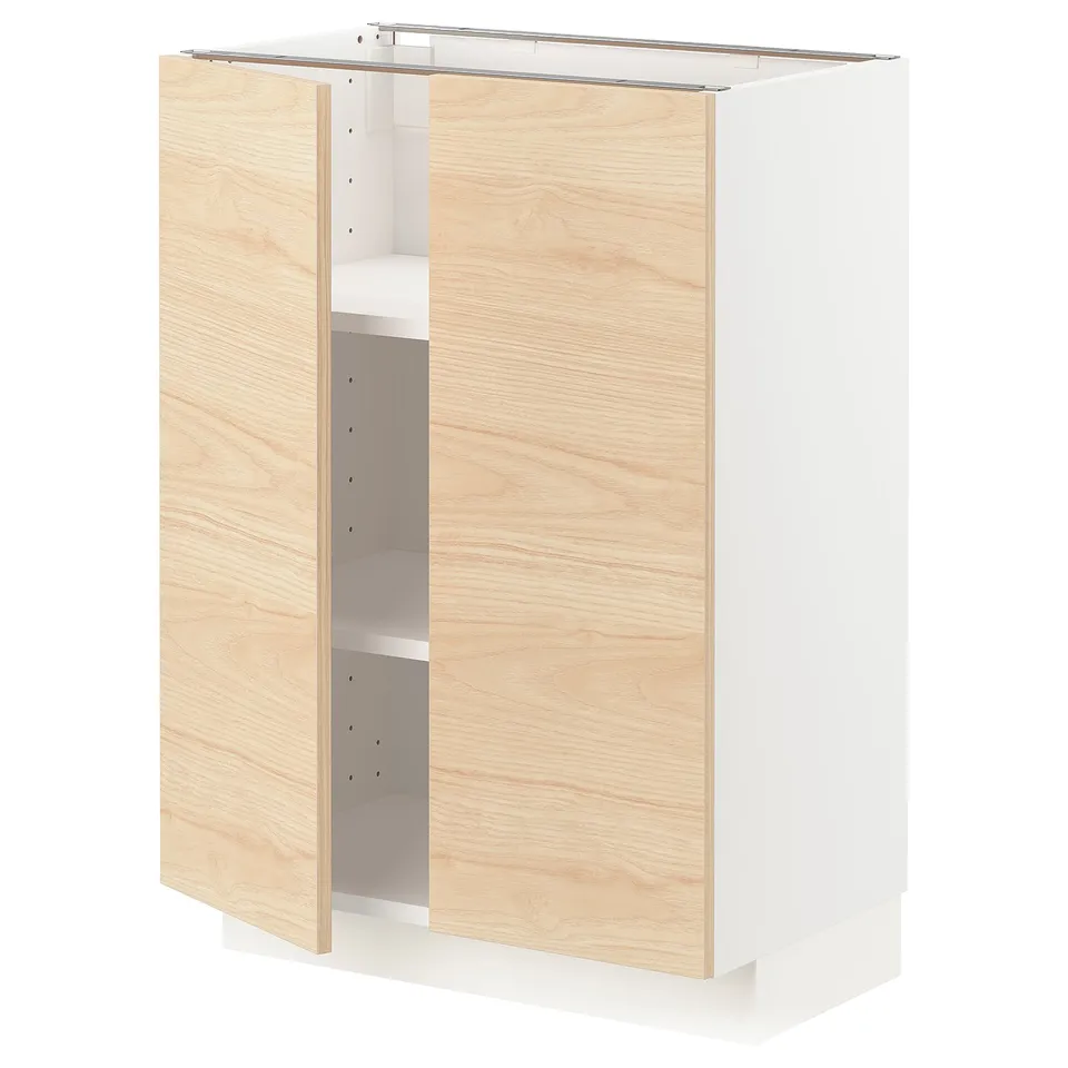 A METOD kitchen cabinet with light ash wood doors and a white frame.